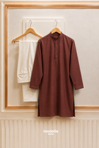 Rust Terracotta – Earthy warmth inspired by rain-soaked soil.